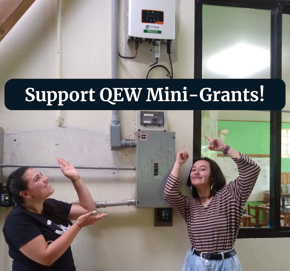 Two teenagers point at solar inverter with text "Support QEW Mini-Grants